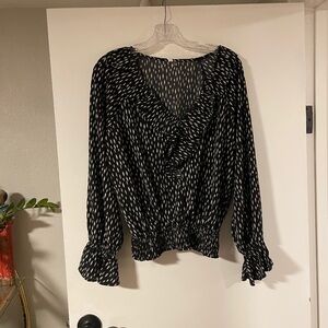 Glam Black and White Ruffle V Neck Blouse